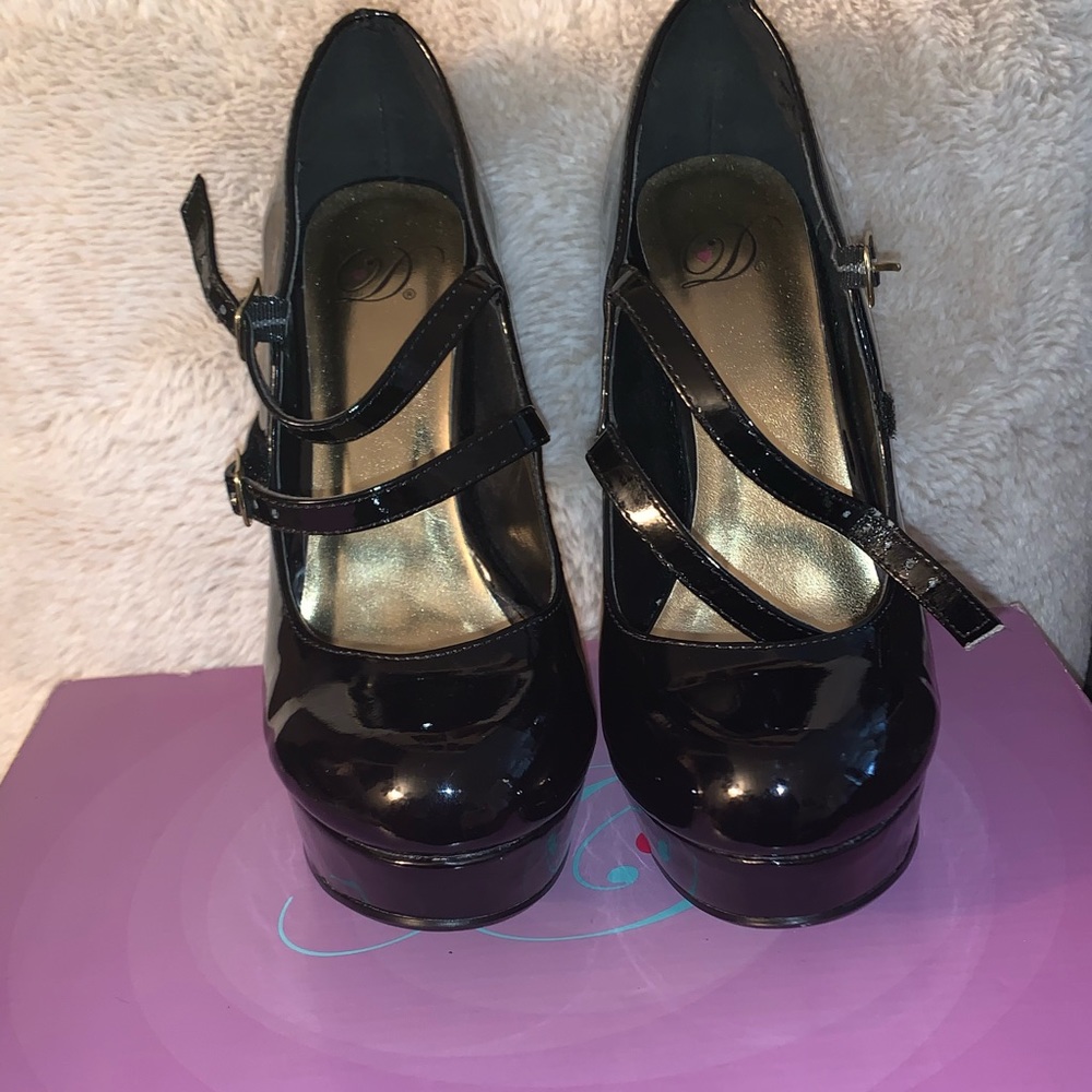 Black platform stilletto w/front Velcro strap, and button strap Baby doll heels